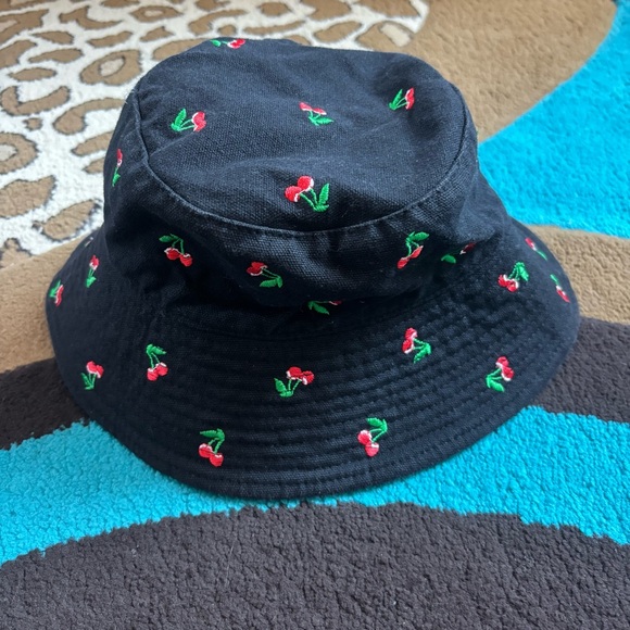 Urban Outfitters Accessories - Urban Outfitters Black Bucket Hat with Cherry Design